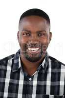 Happy man standing against white background