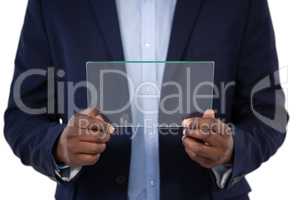 Businessman using a glass digital tablet