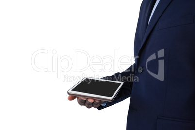 Businessman holding digital tablet