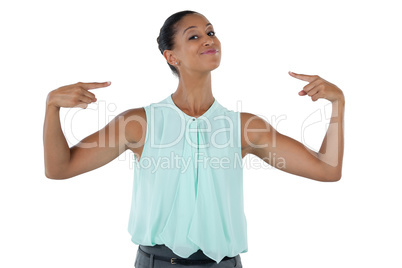 Happy woman pointing at herself