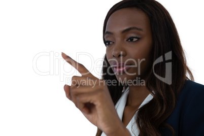 Close up of confident businesswoman touching invisible screen