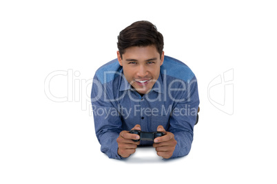 Portrait of businessman playing video game