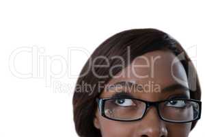 Cropped image of woman with eyeglasses looking up