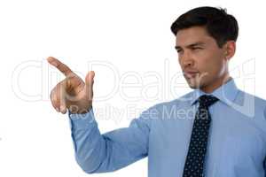 Businessman touching invisible interface