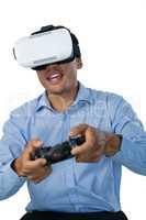 Businessman wearing vr glasses while playing video game