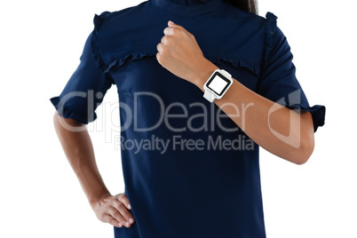 Female executive showing her smartwatch