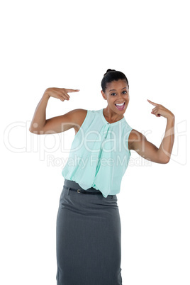 Happy woman pointing at herself