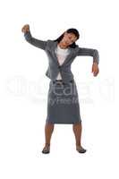 Businesswoman dancing against white background