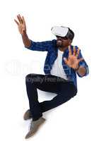 Man gesturing while using virtual reality headset