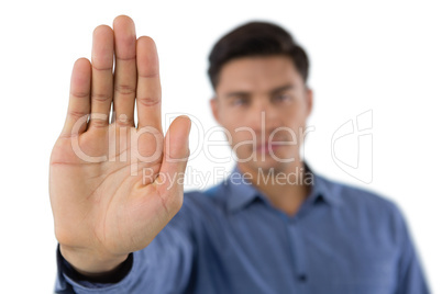 Close up of business man showing shop gesture