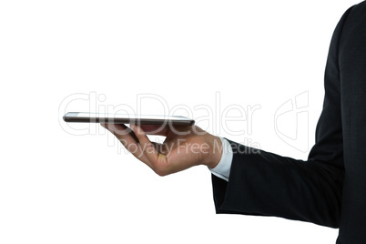 Cropped image of businessman holding tablet computer