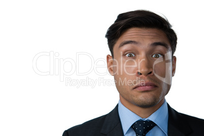 Close up portrait of businessman making a face