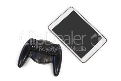 Joystick and digital tablet on white background