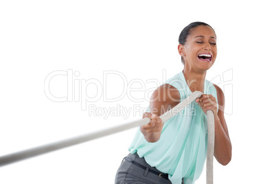 Businesswoman pulling the rope