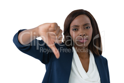 Close up portrait of businesswoman showing thumbs down