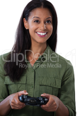 Woman playing video game against white background
