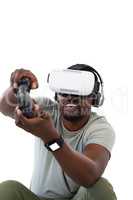 Man using virtual reality headset and playing video game