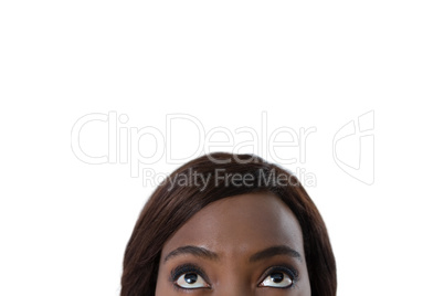 Cropped image of woman looking up