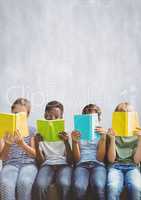 Group of children reading books in front of bright background