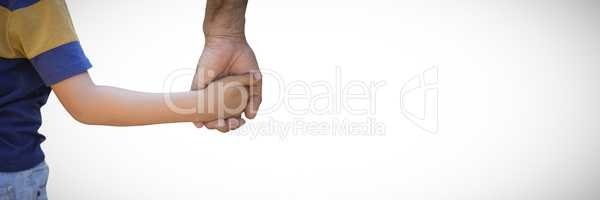 Close up of father and son hands against white background