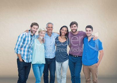 Group of people standing in front of blank brown background