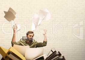 Frustrated business man throwing paper against white background