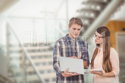 Business people looking at a computer