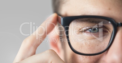 Portrait of Man wearing glasses with grey background