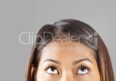 Portrait of woman's eyes with grey background