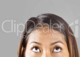 Portrait of woman's eyes with grey background