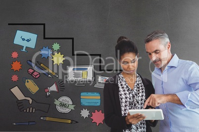 Business people using a tablet against grey background with graphics