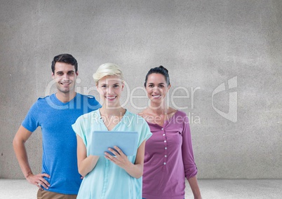 Group of people standing in front of blank grey background