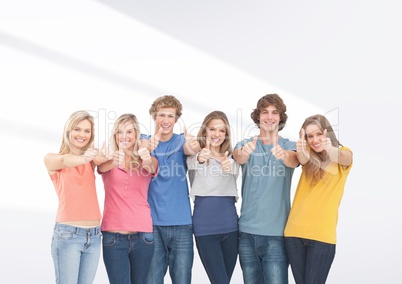 Group of friends standing in front of blank grey background