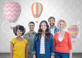 Group of people standing in front of hot air balloons