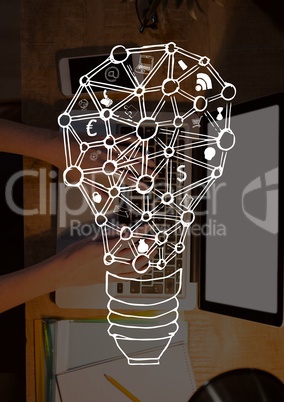 Bulb icon against person using a computer photo