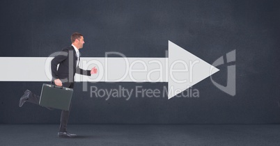 Business man running against blue background with white arrow