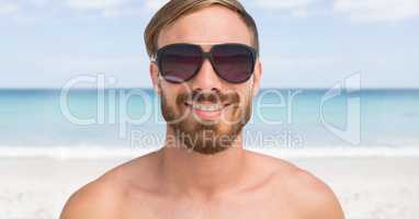 Man at the beach smiling