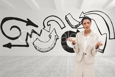 Confused business woman standing against white room background with black arrows
