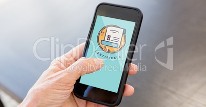 Hand holding phone displaying certificate icon