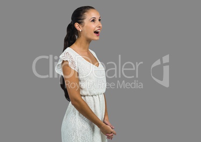 Portrait of woman singing with grey background