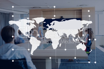 World map icon against office meeting background