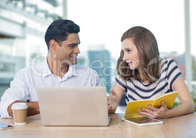 Business people at a desk using a computer