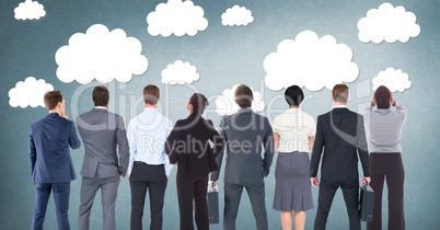 Group of business people standing in front of clouds graphics