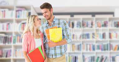 Students in front of library bookshelves background