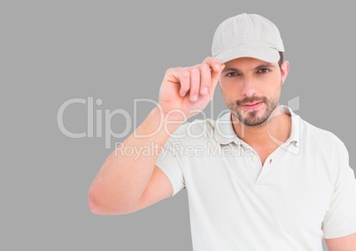 Portrait of Man wearing cap with grey background