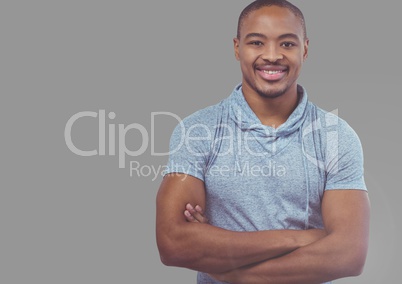 Portrait of Man with folded arms with grey background