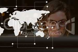World map icon against woman at a computer photo