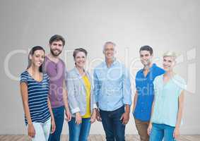 Group of people standing in front of blank grey background