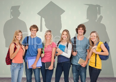 Group of students standing in front of  graduate shadows