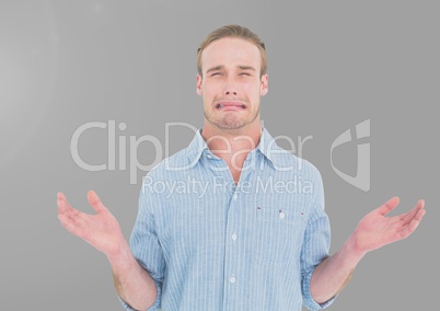 Portrait of frustrated upset Man with grey background